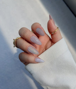 Clean Rainbow Cat-eye handmade press-on nails featuring pale pink cat eye nails