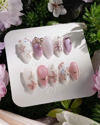 Clematis-Visionaria nail art close-up showing Elegant Taro Purple, Hand-painted Clematis & Delicate Bow. details