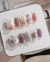 Clematis-Visionaria press-on nails in short oval shape — Elegant Taro Purple, Hand-painted Clematis & Delicate Bow.