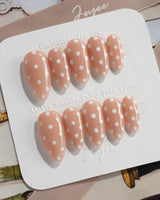 Cloud Cream press-on nails — Peach Nude, Sweet White Polka Dots. handmade nail art by Joyee Nails