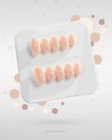 Cloud Cream press-on nails — Peach Nude, Sweet White Polka Dots. handmade nail art by Joyee Nails