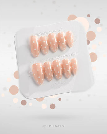 Cloud Cream-Mini press-on nails — Peach Nude, Sweet White Polka Dots. handmade nail art by Joyee Nails