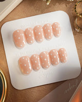 Cloud Cream-Mini press-on nails — Peach Nude, Sweet White Polka Dots. handmade nail art by Joyee Nails