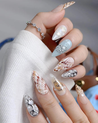 Coastline Edit close-up of 3D shells, starfish, pearls, and ocean-blue gel