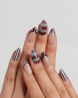 Cocoa Dot skittle nail set with brown-on-blue dots and cream chocolate stripes