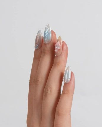 Color Rush press-on nails in short almond shape — Aurora Glaze Style, 3D Smudged Florals & Fluid Water Ripples.