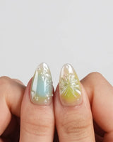 Color Rush press-on nails in short almond shape — Aurora Glaze Style, 3D Smudged Florals & Fluid Water Ripples.