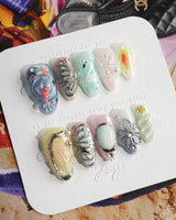 Como Blue soft luxury nails with butterfly sculpture, goldfish, and pearl dew accents