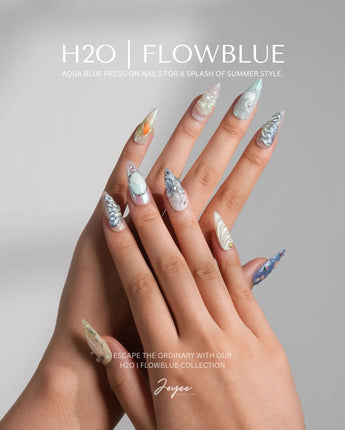 Como Blue medium stiletto nails with pearly pastels and serene lakeside fish details