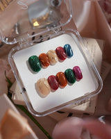 Confetti Pop nails in short oval — Multicolor Gemstone Palette, Metallic