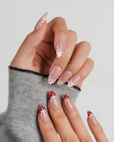 Coquette Dot custom-size medium almond nails with lace, bows and dotted tips