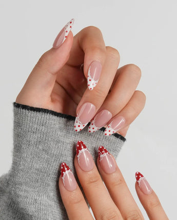Coquette Dot custom-size medium almond nails with lace, bows and dotted tips