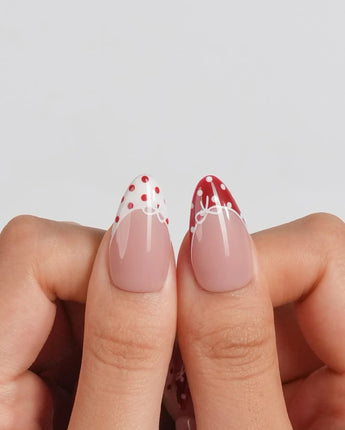 Coquette Dot medium almond nail set with hand-sculpted lace scallops and bows