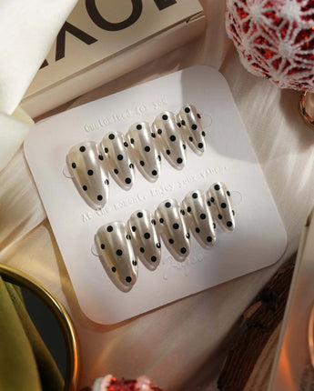 Cosmo Dots press-ons with silver chrome shine, retro dot pattern, and glossy gel finish