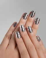Cosmo Dots nail art close-up showing Silver Metallic Chrome, Retro Black Polka Dots details