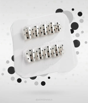 Cosmo Dots handmade press-on nails featuring Silver Metallic Chrome, Retro Black Polka Dots