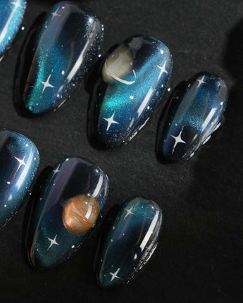 Cosmoseek nail art close-up showing Deep Blue Galaxy Cat-eye, 3D Planets & Stars. details