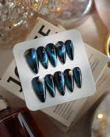 Cosmoseek press-on nails in medium stiletto shape — Deep Blue Galaxy Cat-eye, 3D Planets & Stars.