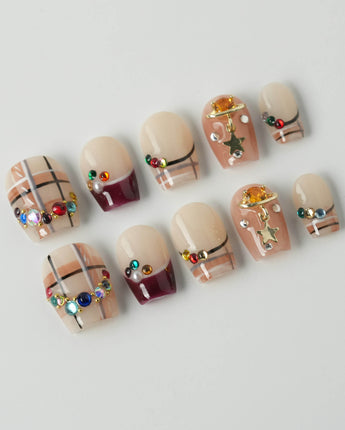 Cozy Plaid press-on nails in extra short coffin shape — British Plaid, Colorful Rhinestone & Planet Charm.