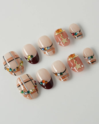 Cozy Plaid press-on nails in extra short oval shape — British Plaid, Colorful Rhinestone & Planet Charm.