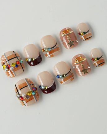 Cozy Plaid press-on nails in extra short squoval shape — British Plaid, Colorful Rhinestone & Planet Charm.