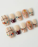 Cozy Plaid press-on nails in short coffin shape — British Plaid, Colorful Rhinestone & Planet Charm.