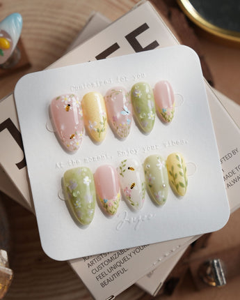 Cream Garden nail art close-up showing Pastoral Style, Hand-painted Bees & Wildflowers. details