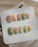 Cream Garden press-on nails in extra short squoval shape — Pastoral Style, Hand-painted Bees & Wildflowers.