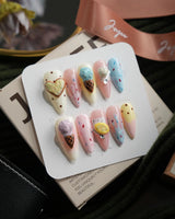 Cream Scoop medium stiletto press-on nails