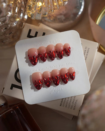 Crimson Queen nails in extra short almond — Nude Pink to Black-Red