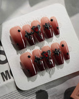 Crimson Veil press-on nails in medium coffin shape — Red & Black Gradient, 3D Punk Heart & Spider.