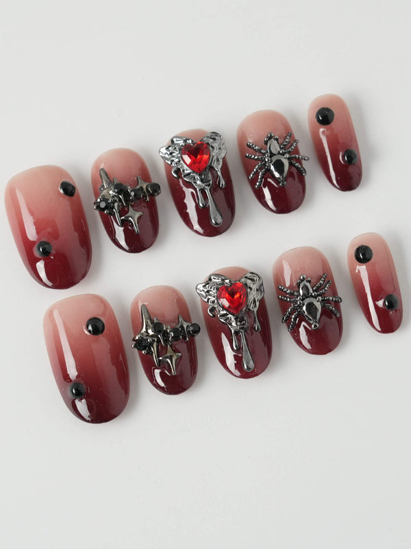 Crimson Veil press-on nails in short oval shape — Red & Black Gradient, 3D Punk Heart & Spider.