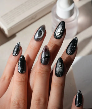 Crow Moon press on nails with a hand-painted crow on a branch, bare winter trees, black cats and bats on silver cat eye with 3D silver vines - image 2