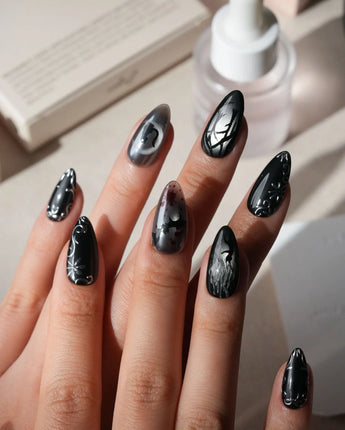 Crow Moon press on nails with a hand-painted crow on a branch, bare winter trees, black cats and bats on silver cat eye with 3D silver vines - image 2
