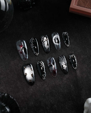Crow Moon press on nails with a hand-painted crow on a branch, bare winter trees, black cats and bats on silver cat eye with 3D silver vines - image 3