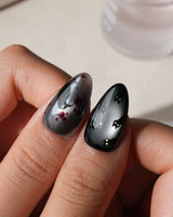 Crow Moon press on nails with a hand-painted crow on a branch, bare winter trees, black cats and bats on silver cat eye with 3D silver vines - image 4