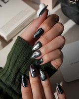 Crow Moon press on nails with a hand-painted crow on a branch, bare winter trees, black cats and bats on silver cat eye with 3D silver vines - image 5