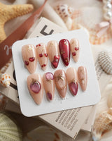 Crystal Berry medium stiletto press-on nails with deep red and burgundy fall nail art