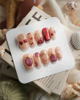 Crystal Berry short coffin press-on nails with deep red and burgundy fall nail art