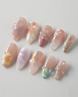 Wonderland Whims custom pink glossy floral nail art with sculpted petals and pearls