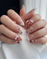 Cherry Miss nail art close-up showing Red White French, 3D Bow & Cherry. details