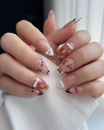 Cherry Miss nail art close-up showing Red White French, 3D Bow & Cherry. details