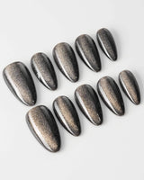 Black Cat-eye custom press-on nails — available in multiple shapes and sizes