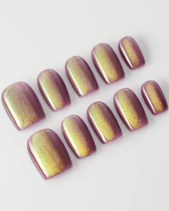 Brown Acrylic Cat-eye nails with polished brown shimmer and glossy acrylic-style finish