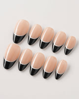 Classic Return - Ebony press-on nails with glossy black tips and minimalist white accents