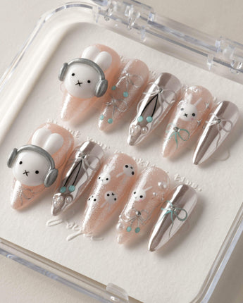 Miffy's Vacay custom press-ons with vacation-inspired cute art and reflective chrome