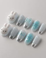Miffy Summer reusable nails with soft blue white French tips and 3D bow charm