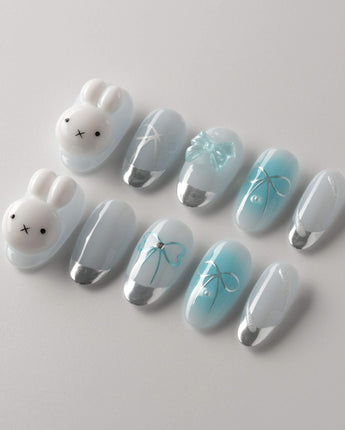 Miffy Summer reusable nails with soft blue white French tips and 3D bow charm