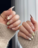 Fall Palette press-on nails with mixed autumn colors and fall-inspired gel details