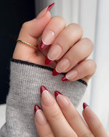 Classic Return - Rose nails with burgundy French tips, nude pink base, and white line detail